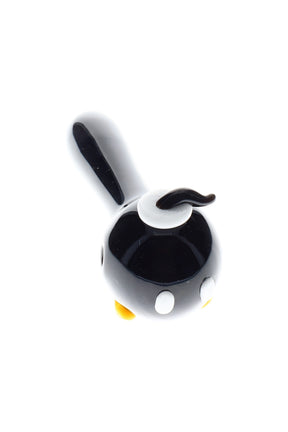 Top-down bomber glass hand pipe with glossy black body, white cap, curled fuse, and compact spoon shape