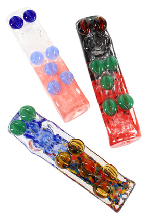 Rectangular 4–5″ multicolor frit square glass hand pipe with recessed bowl and raised grip marbles, shown in assorted color combinations.