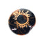 2-inch round black ceramic smoke stone hand pipe with metallic gold sun and marbled accents.