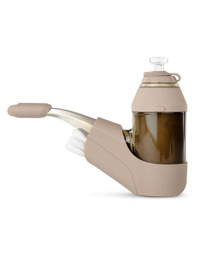 Puffco Proxy with Desert Travel Pack installed, showing backpack storage, mouthpiece cover, and tethered chamber cap with glass ball cap.