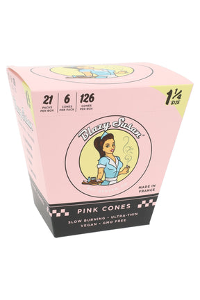 A box of Blazy Susan 1 1/4 pre-rolled paper cones in pink color with a graphic of a woman on the front and text indicating the product is made in France.
