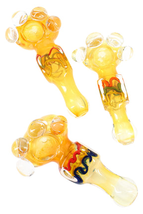 5″ color-changing glass spoon hand pipe with squiggle-striped cube neck and clear marble roll-stoppers; ships in assorted colors.