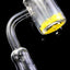 Side angle of domeless thermochromic quartz banger with 14.5 mm male joint and clear bucket on black background.