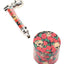 Rosy Skulls design metal pipe with matching 1½″ 4-part metal herb grinder gift set; bold floral skull pattern throughout.