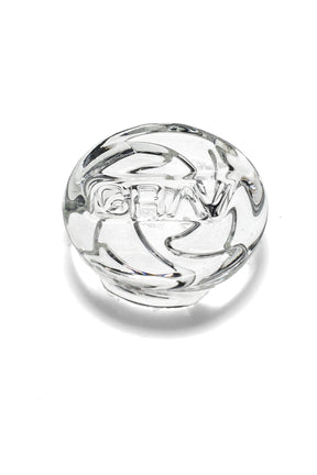 Clear GRAV spinner carb cap with puck-shaped top and triple-channel directional airflow grooves, designed for bucket bangers.