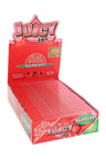 Juicy Jay’s Raspberry 1¼ flavored rolling papers display box, red theme with berry graphics and full 24-pack layout.