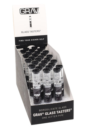 Retail 30-count display box filled with GRAV 12 mm glass tasters, clear one-hitters with black graphic wraps arranged upright.