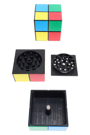 3-part plastic Rubik’s-cube herb grinder, 1½″ size, shown assembled and disassembled with magnetic plates and catch chamber.