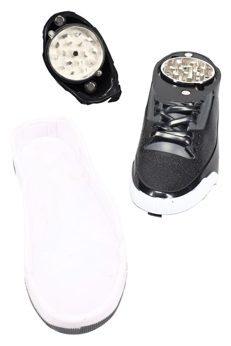 Disassembled “Tear Force 1” sneaker grinder showing magnetized 3-part metal teeth and collection chamber on white backdrop.