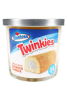 14-oz triple-wick Hostess Twinkies scented candle, yellow wax jar depicting classic cream-filled snack cake under metal lid