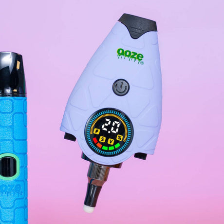 Ooze Hover concentrate vaporizer in lavender with illuminated battery and voltage display screen