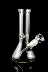 Angled view of clear 10-inch glass beaker bong with thick base, male bowl, and 9 mm glass construction